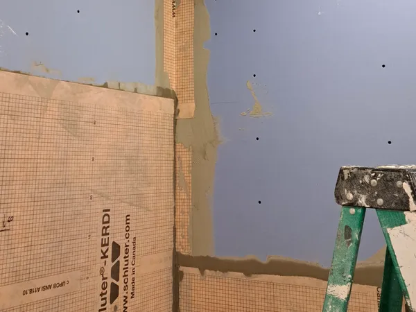 Substrate ground and patched flat before tiling