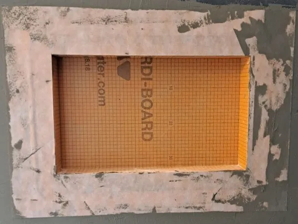 Waterproofing membrane sealed at the corners and seams